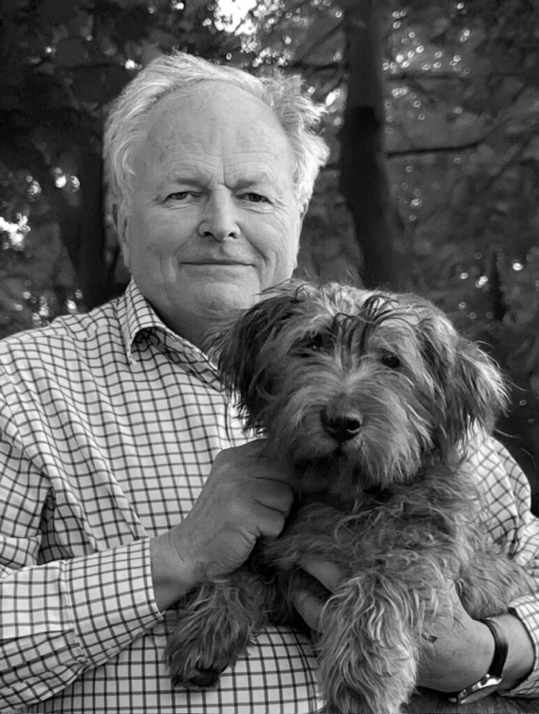 man holding a dog